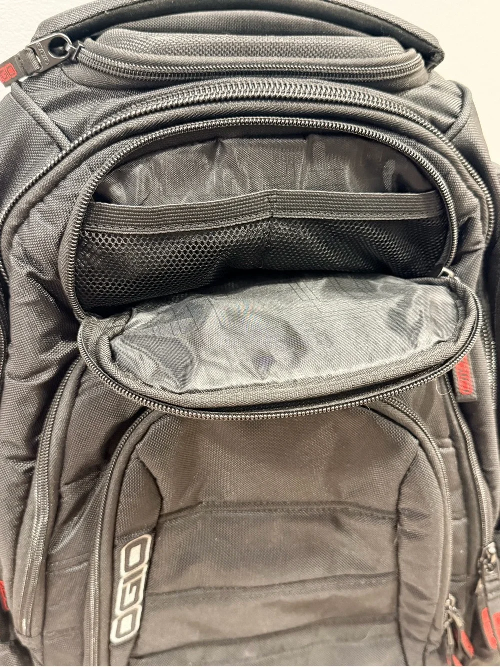 OGIO Black Backpack with Red Zipper Accents